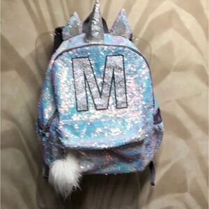 Iridescent silver sequin justice M mini bag backpack pom pom
